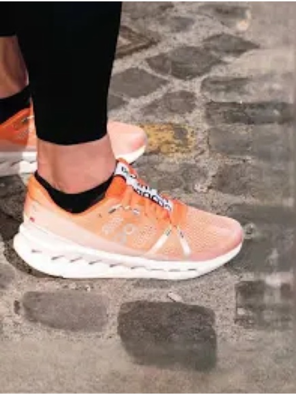 On Running  CLOUDSURFER FLAME Orange and Silver Running Shoe Label Detail